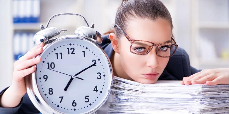 Businesswoman struggling with time management