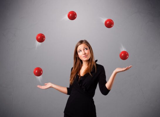 Woman juggling balls